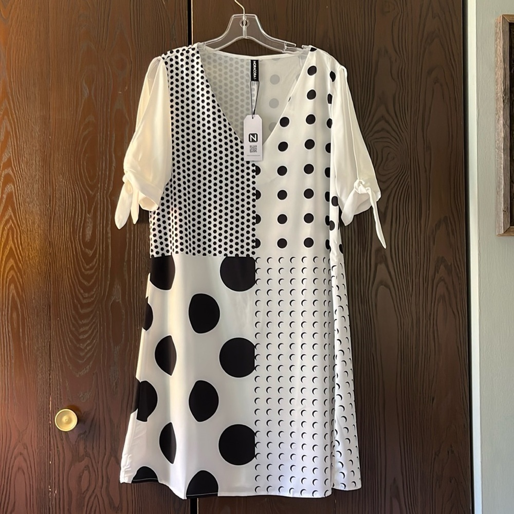 Noracora short sleeved, exposed shoulder white dress with black designs. L NWT